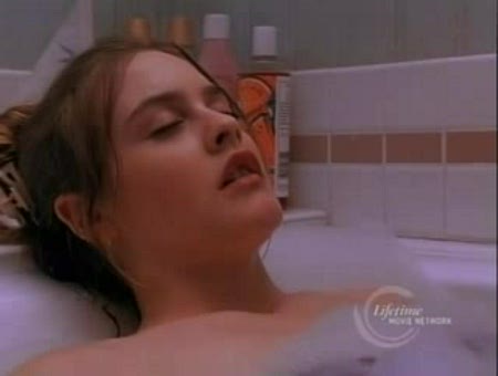 Alicia Silverstone sexy en Babysitter